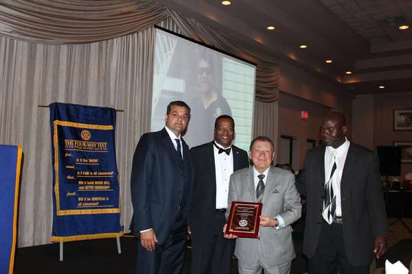 This is a photo of an award ceremony at Aswani K Datt.