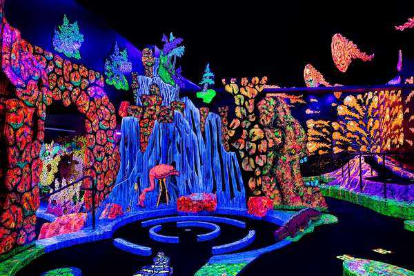 This is a photo of the glow-in-the-dark mini golf at Putting Edge Scarborough.